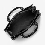 Tasche Schwarz Michael Kors aus hochwertigem Canvas-Stoff mit Reißverschluss und Markenetui.