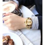 Ice Damenuhr Gold mit elegantem Edelstahlgehäuse und Armband, ideal für jeden Anlass.