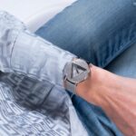 Damenuhr Guess (Ø 36 mm) aus Edelstahl mit grauem Design und Quarz-Uhrwerk.